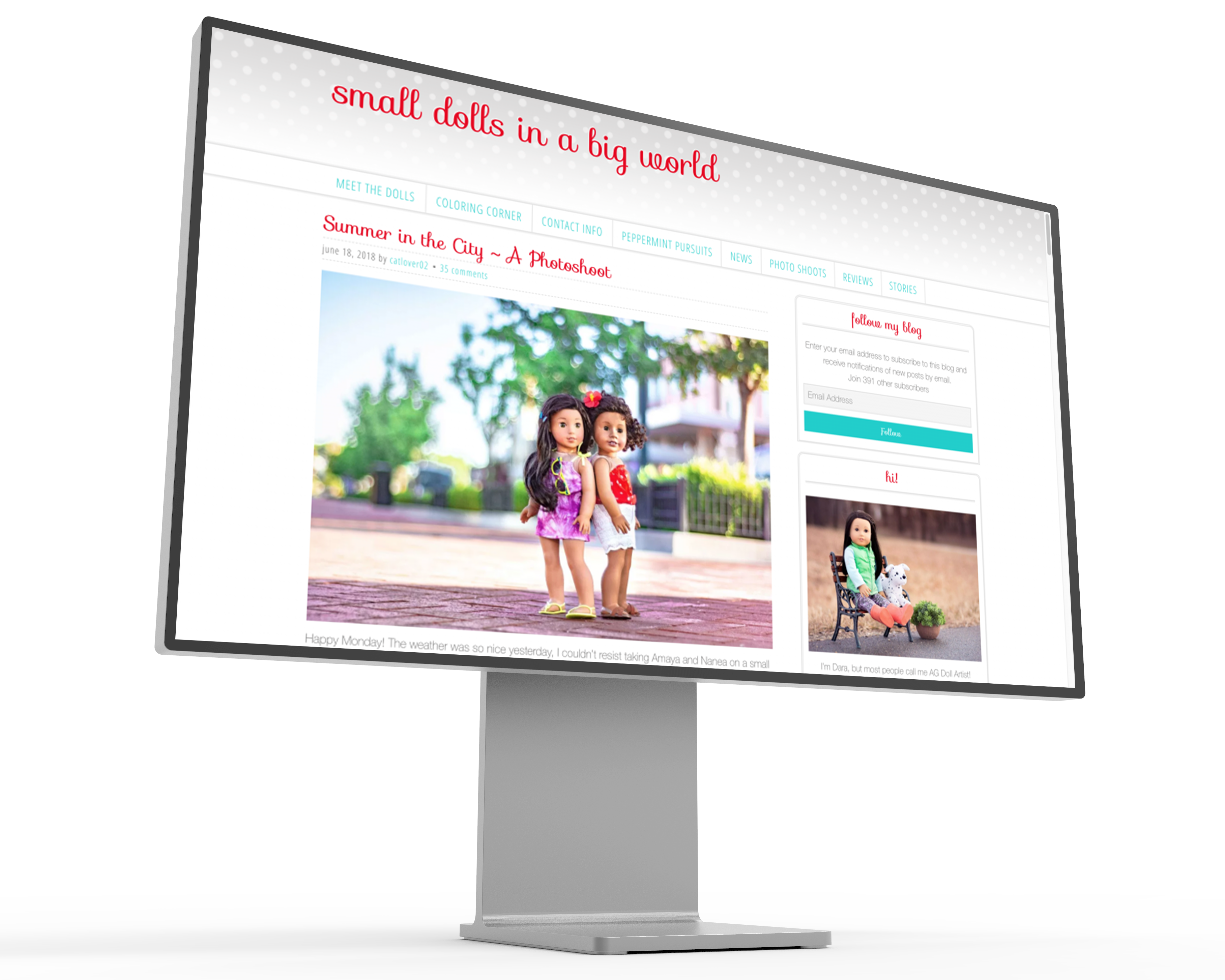 Image of the Small Dolls in a Big World website displayed on a mockup of a Pro XDR Display. 